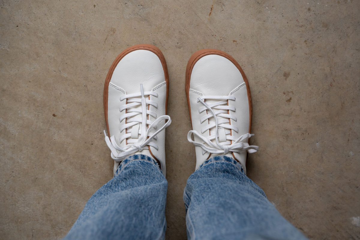 Aviary barefoot shoes are white leather shoes with a wide toe box