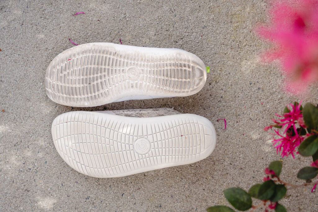 Soles of groundies barefoot and wider barefoot plus shoes