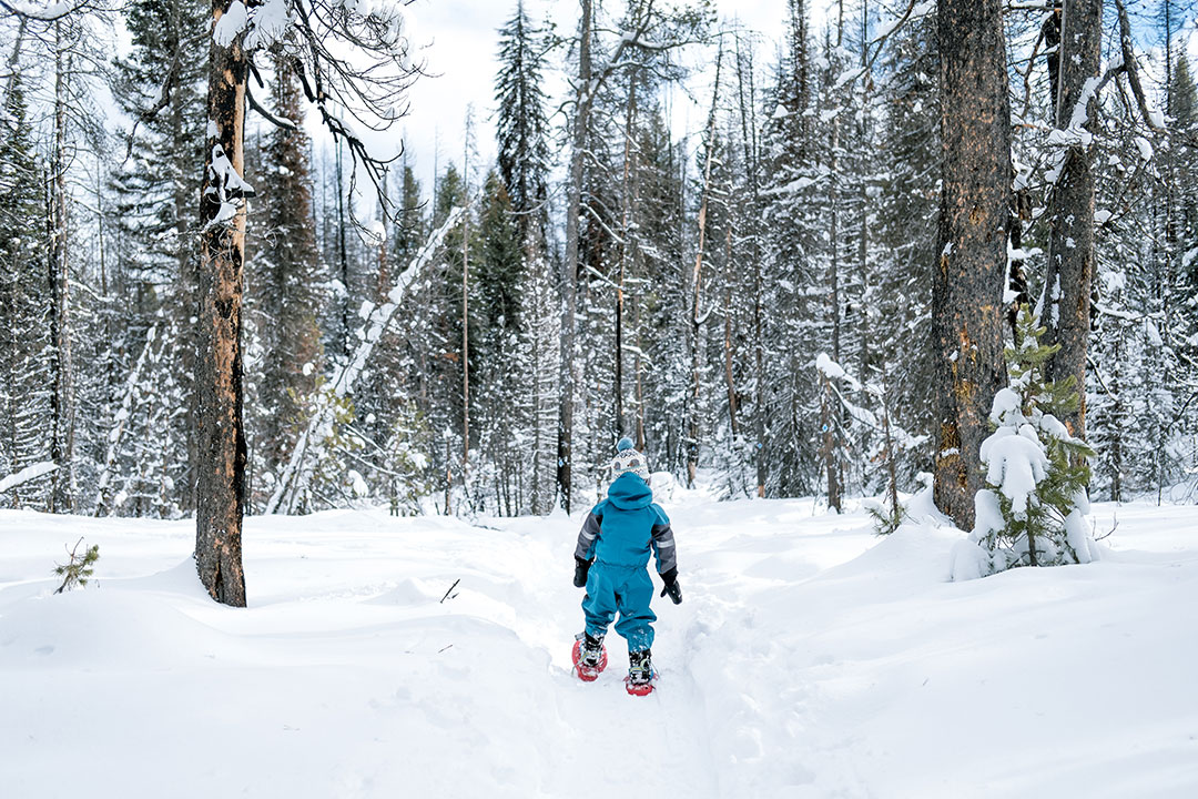 Snowshoeing in barefoot winter boots