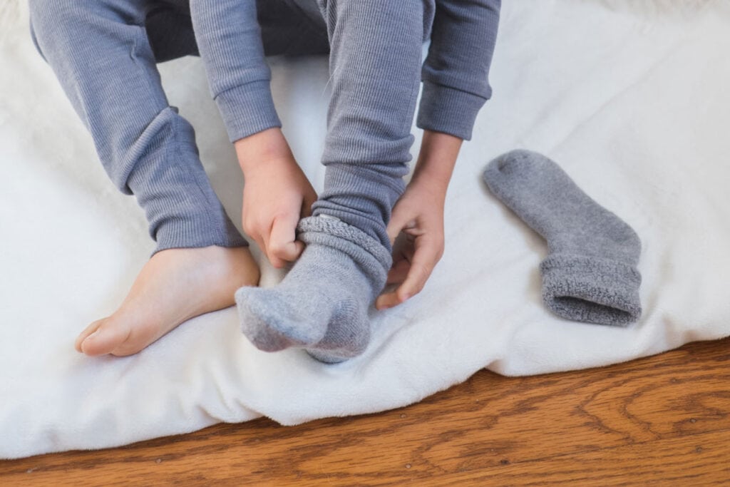 Nui Organics Merino Wool lounge socks are extra thick and wide